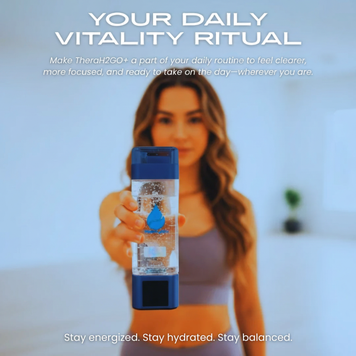Woman holding the TheraH2Go+ toward the camera