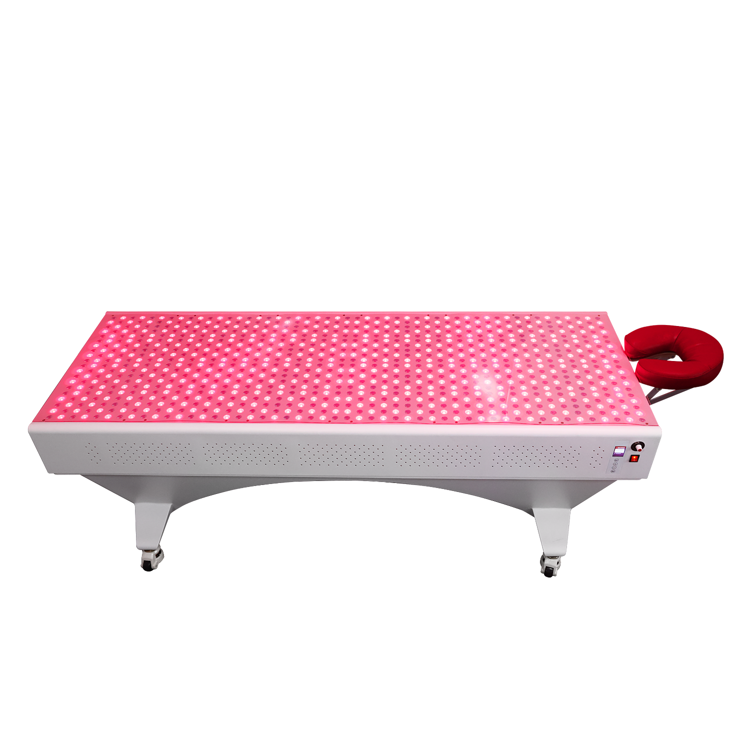 BioLight Adapt System table from above, LED surface glowing with red face cradle at the end