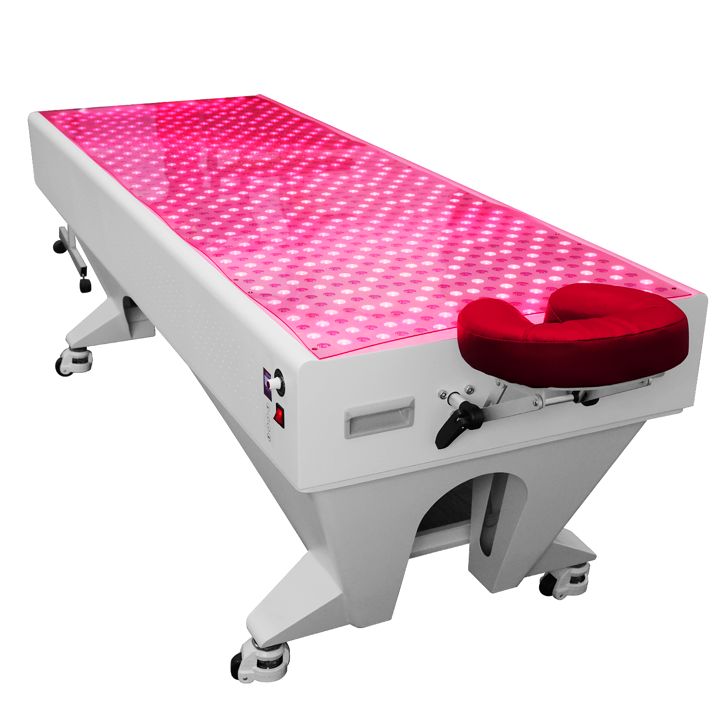 BioLight Adapt System table with lit LED surface and red face cradle, angled close view