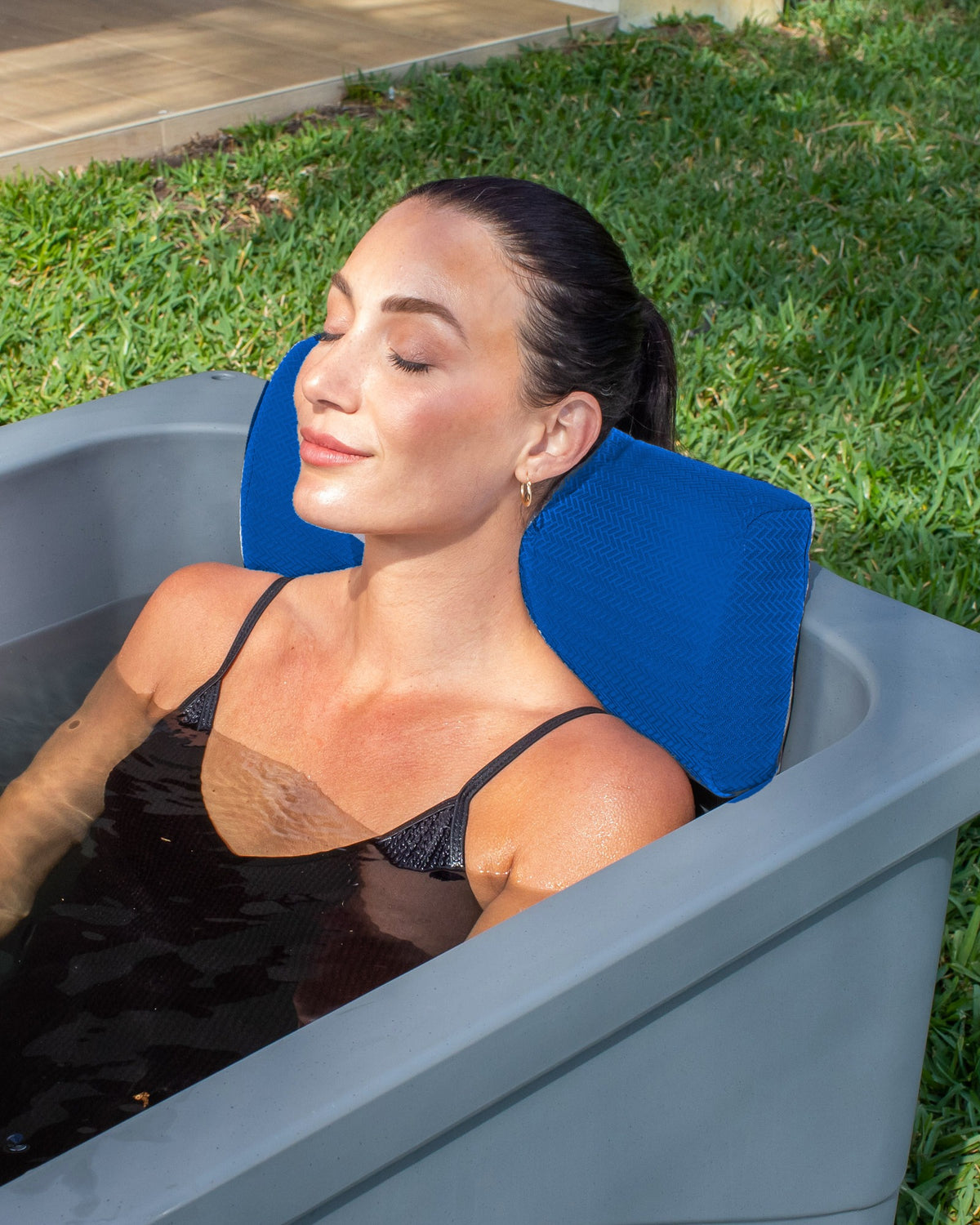Frozin Cold Plunge Pillow in Sapphire Wave, head resting on the pillow #Color_Sapphire Wave