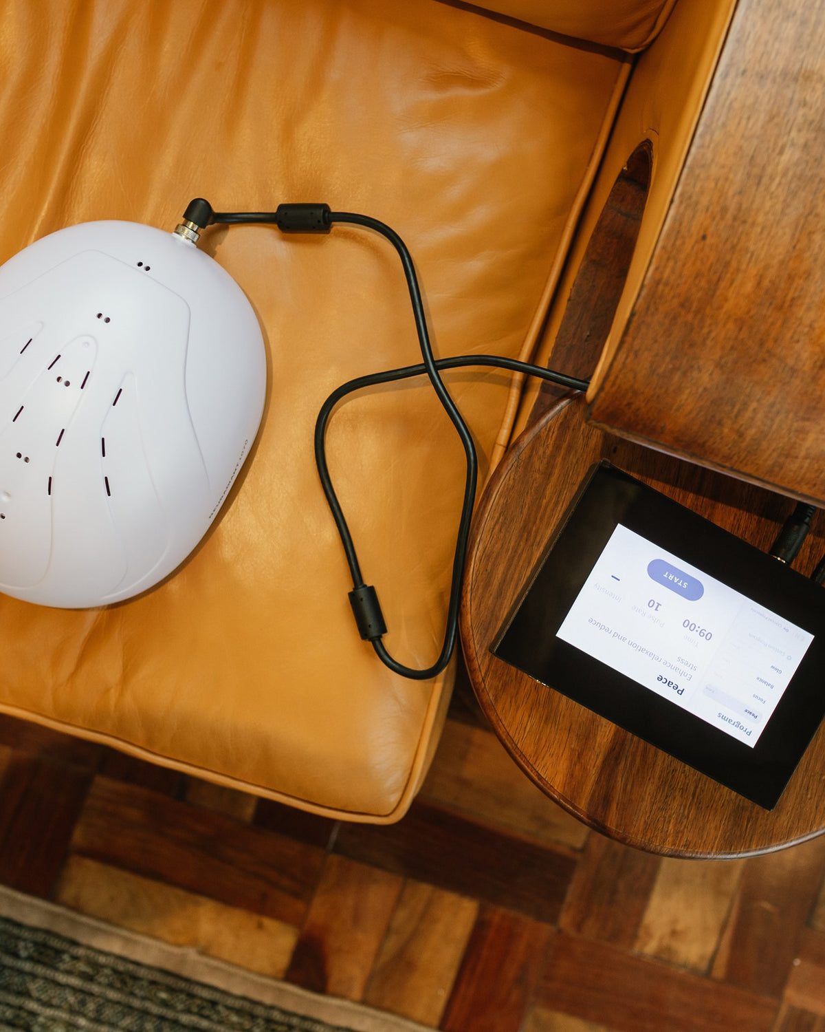 Neuradiant 1070 helmet with its touchscreen controller