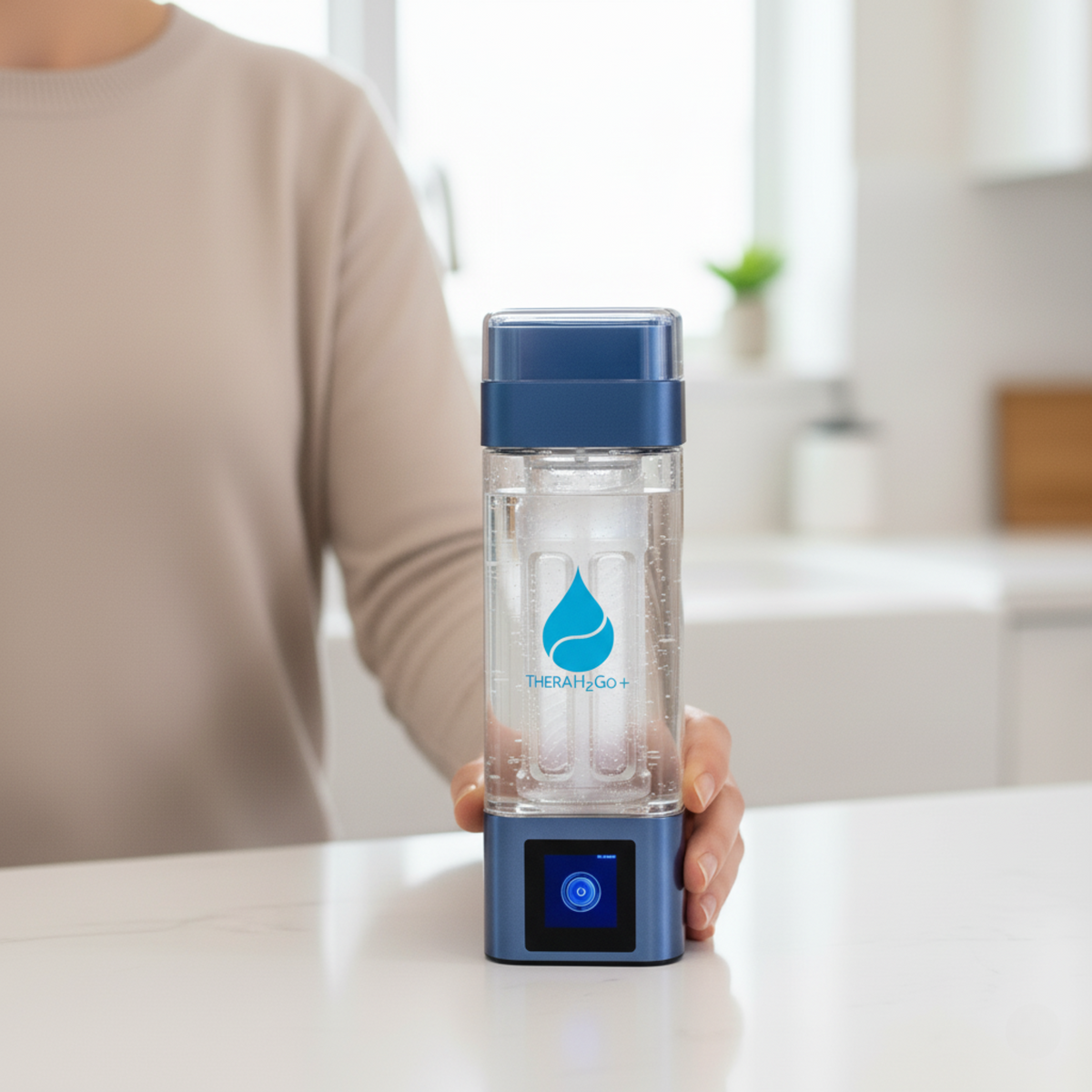 Hand holding the TheraH2Go+ bottle on a kitchen counter