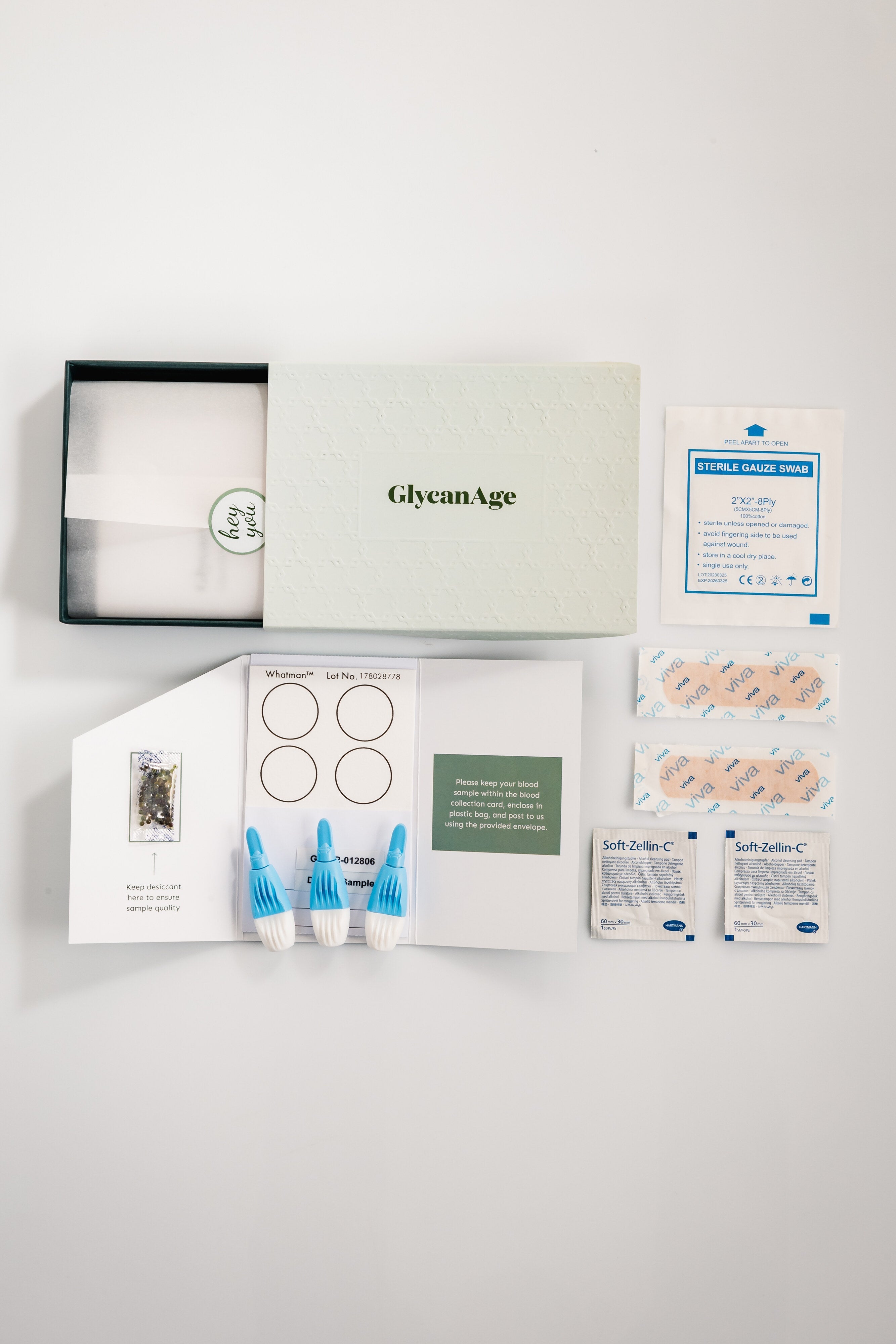 GlycanAge test kit opened, showing what is inside