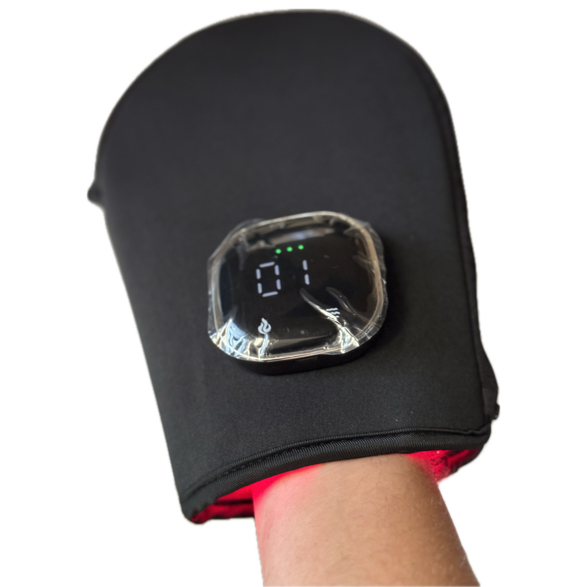 Hand wearing the black neoprene TheraGlove, red light glowing at the cuff