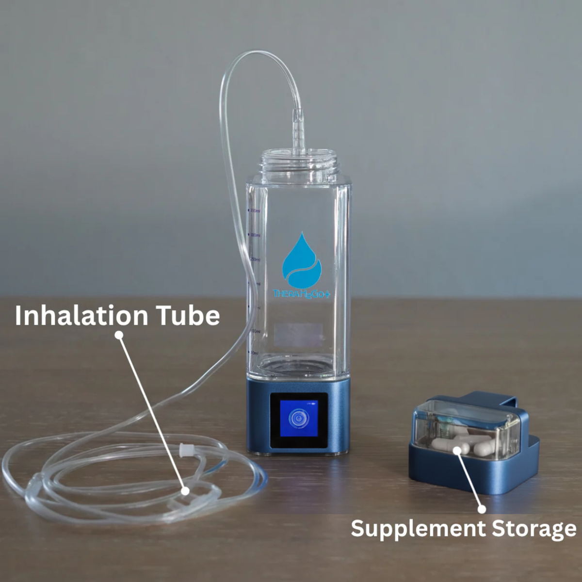 TheraH2Go+ with the inhalation tube attached and a small storage case beside it