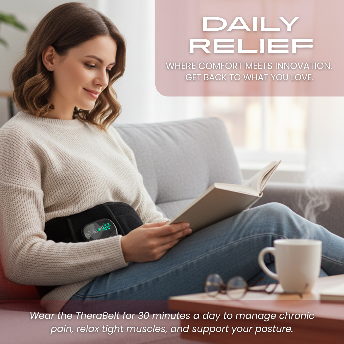 Woman reading on a sofa while wearing the TheraBelt around her waist