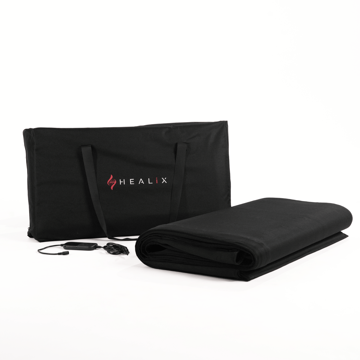 HEALiX Glow Pod folded beside its carry case and controller