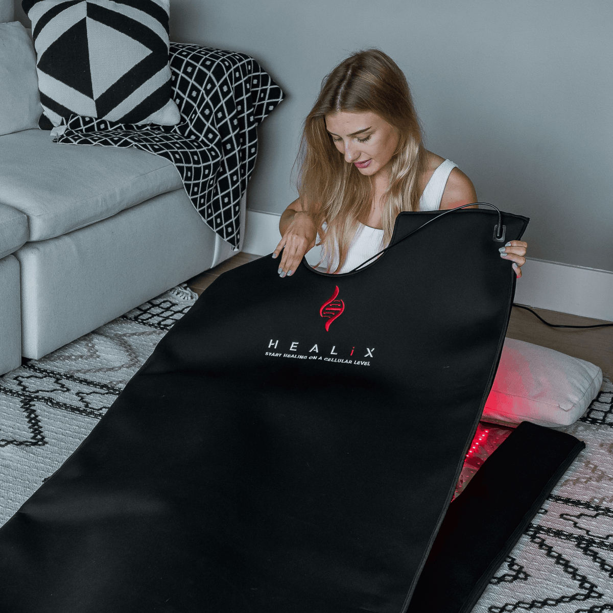 HEALiX Glow Pod top cover lifted open, logo facing out