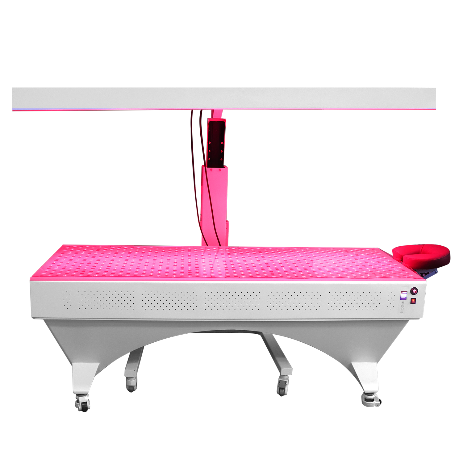 BioLight Adapt System side view, lit table surface below the raised overhead light panel