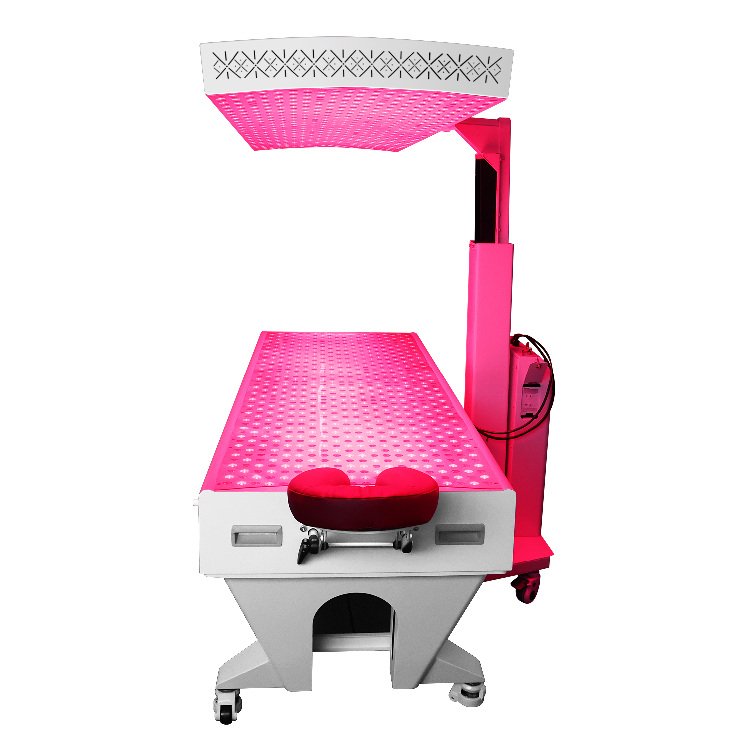 BioLight Adapt System end view with the overhead panel tilted above the lit table and face cradle