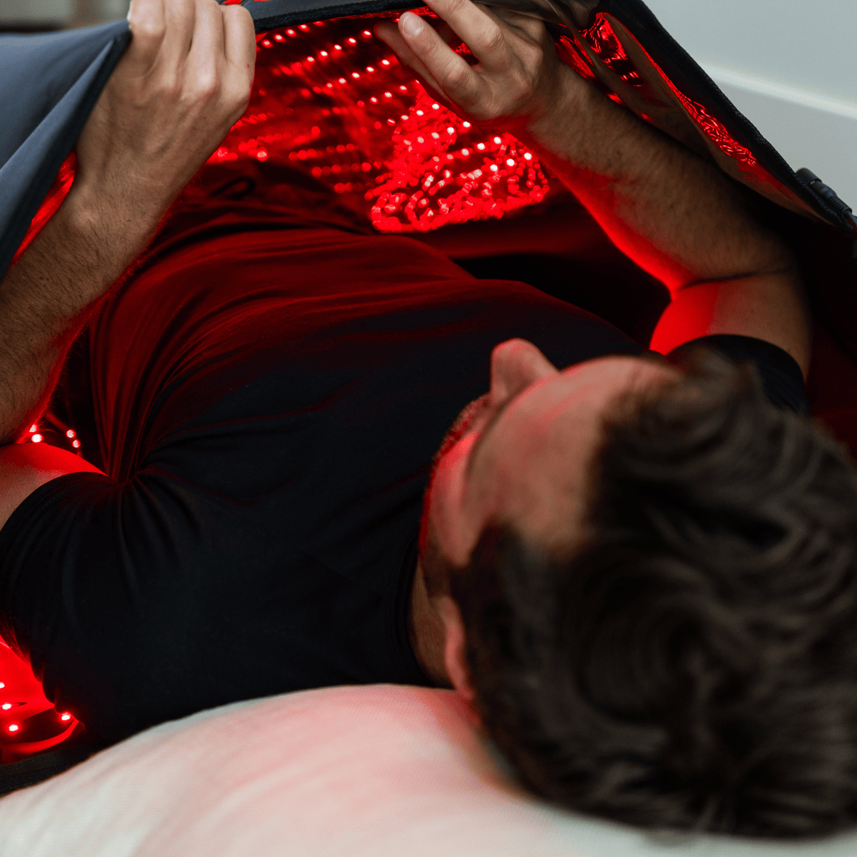 HEALiX Elevate Light Pod session, man lifting the lit top panel