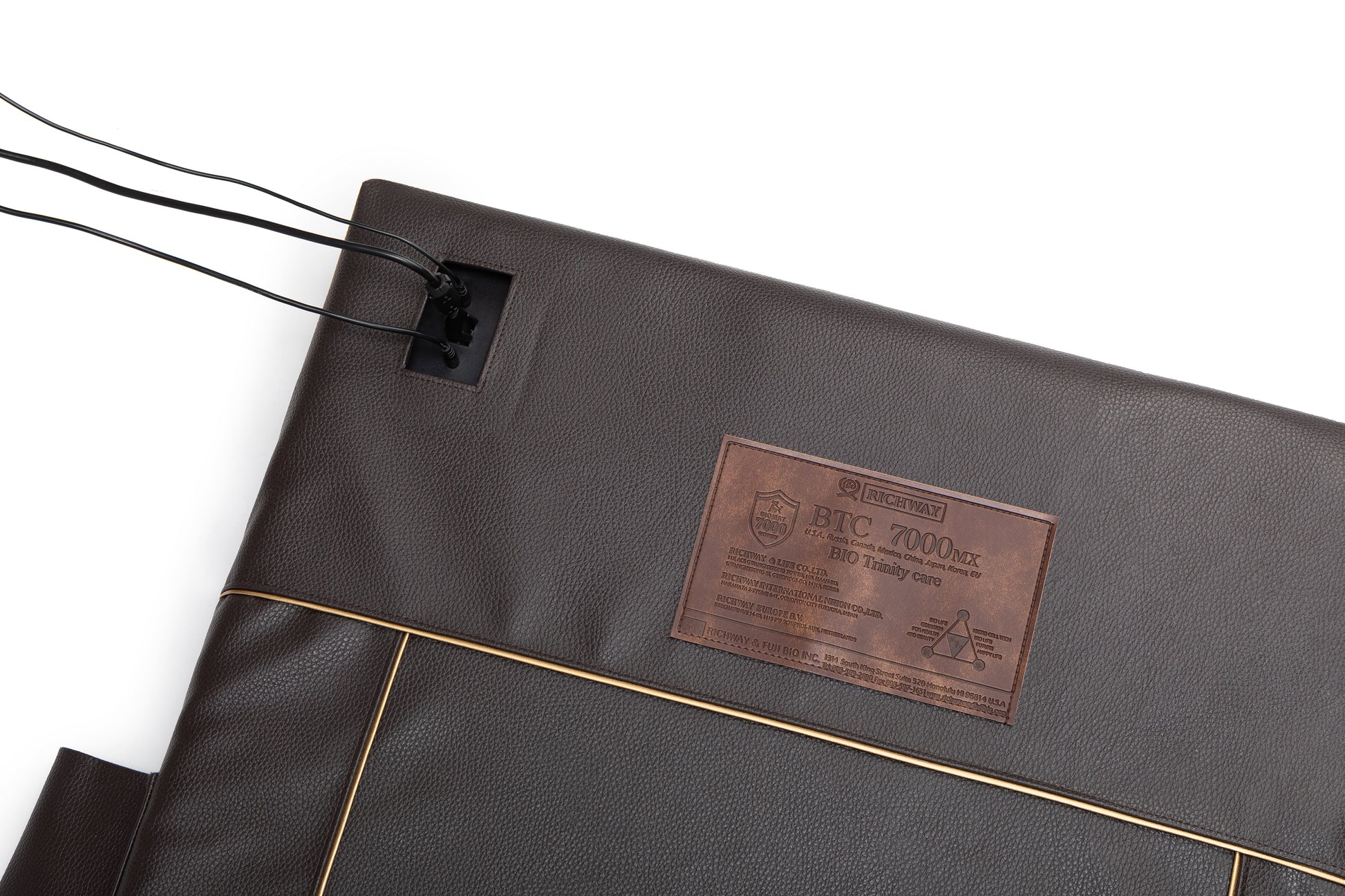 BioMat BioAcoustic Pro, leather detail with cords plugged in