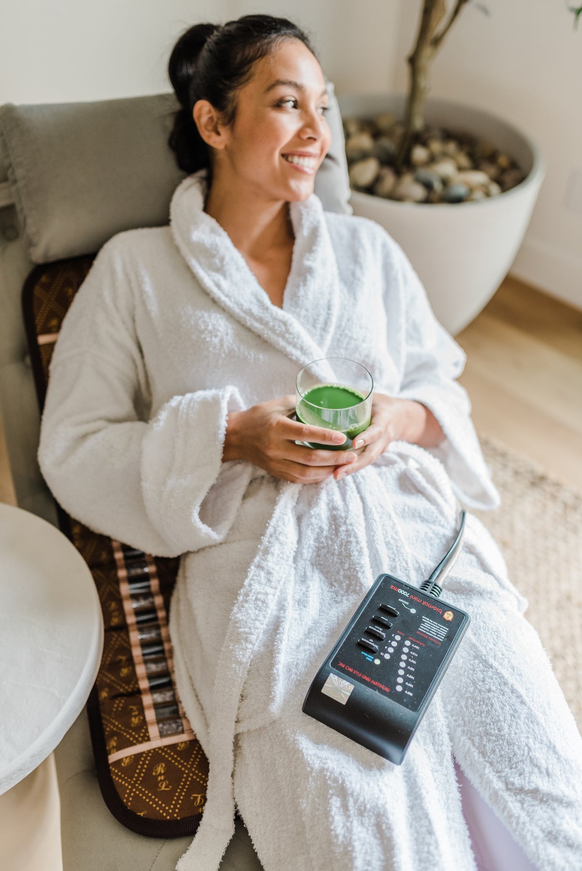 Relaxing in a robe with the BioMat Mini