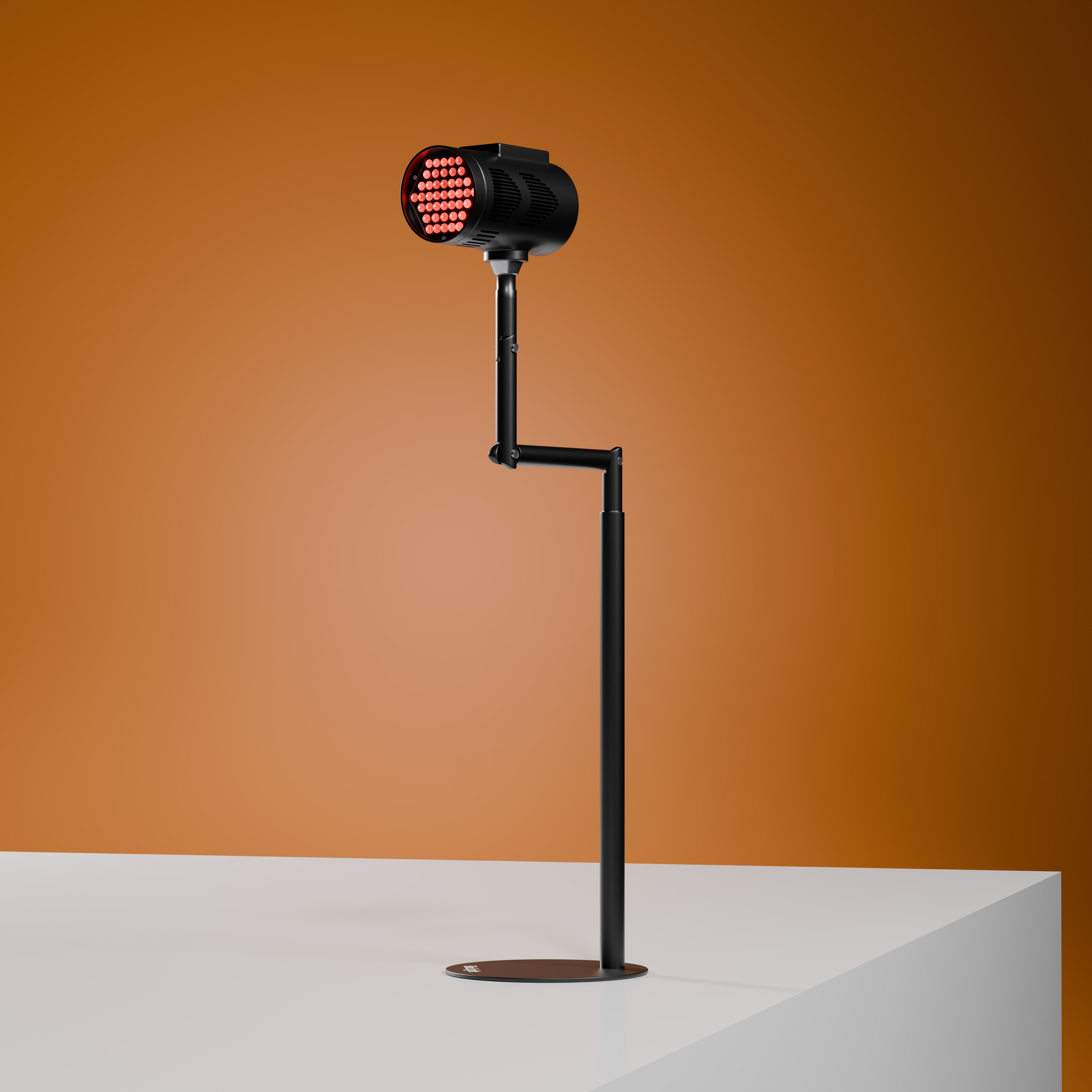 Black BioLight Beam red light therapy device on its adjustable floor stand, LEDs lit