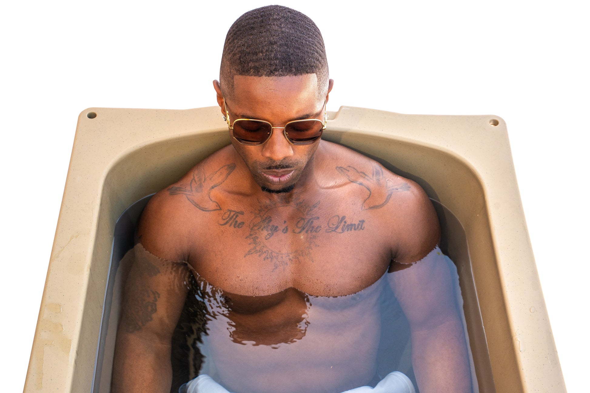 Relaxing in the Frozin 400 Tan cold plunge #Color_Tan