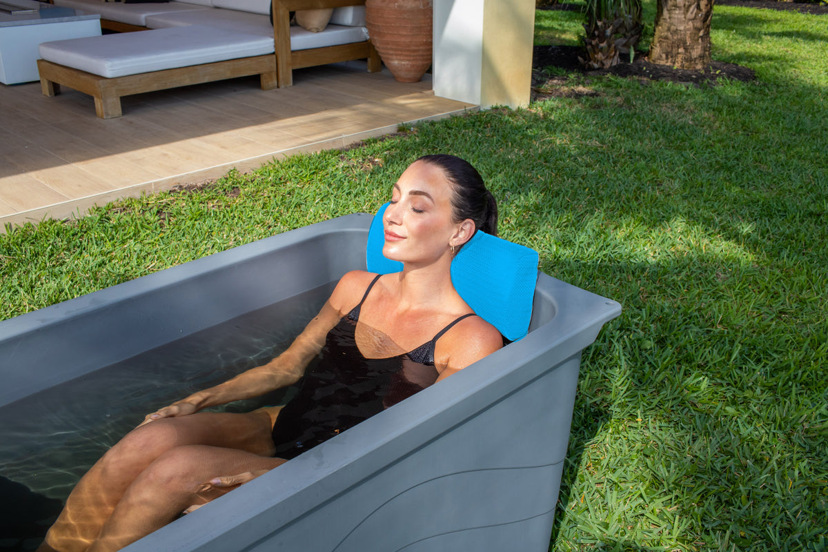 Frozin Cold Plunge Pillow in Havelock Blue, close up in the tub #Color_Havelock Blue