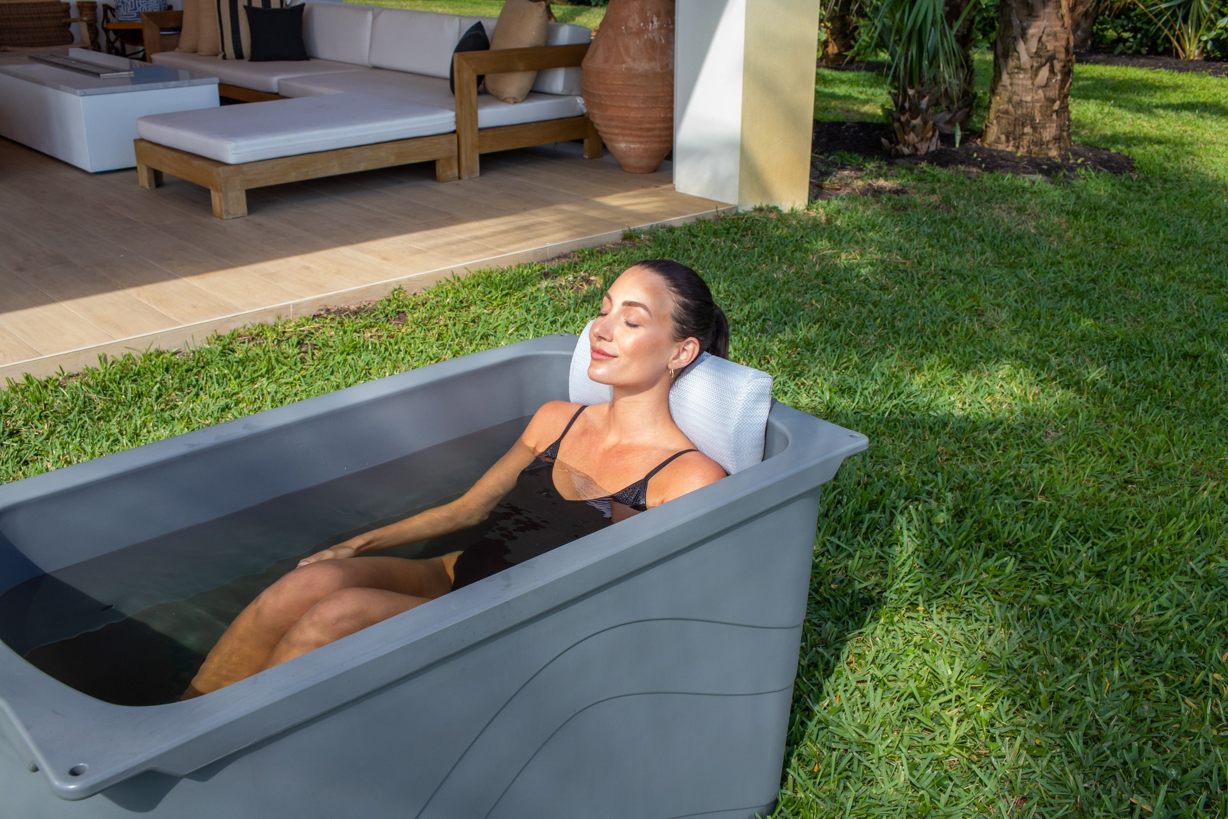 Frozin cold plunge pillow in use #Color_Misty Mountain