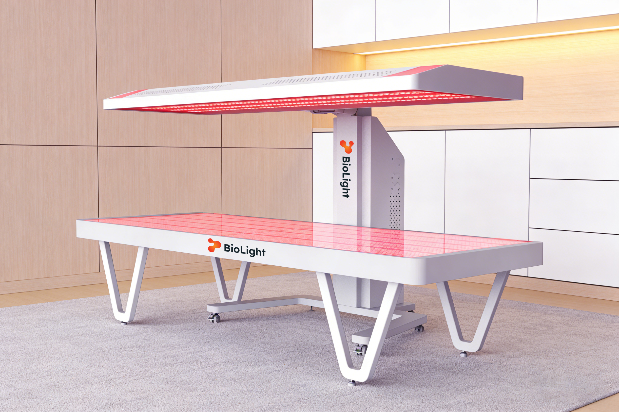 BioLight Arc System red light therapy bed angled view, overhead panel and lit base glowing red